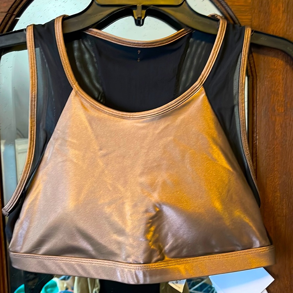 Camryn metallic sports bra with stretch shimmer support fabric.